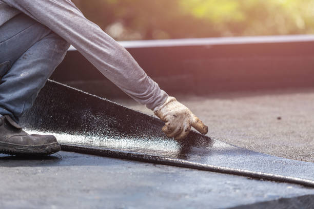 Professional Waterproofing technician working in Newberg, OR